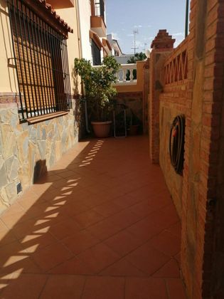 Foto 1 de Venta de casa adosada en Churriana de 3 habitaciones con terraza y piscina