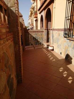 Foto 2 de Venta de casa adosada en Churriana de 3 habitaciones con terraza y piscina
