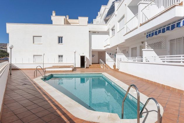 Foto 1 de Piso en venta en calle Los Rosales de 2 habitaciones con terraza y piscina