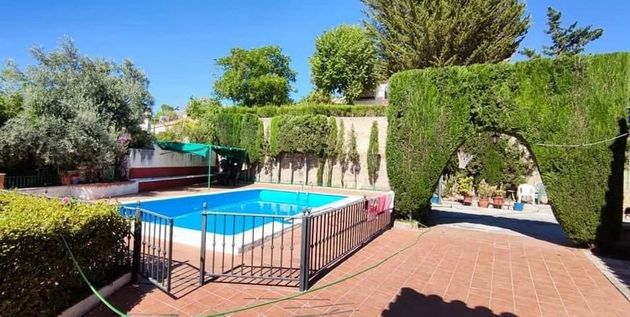 Foto 1 de Chalet en venta en calle Rivera de Los Molinos de 5 habitaciones con terraza y piscina