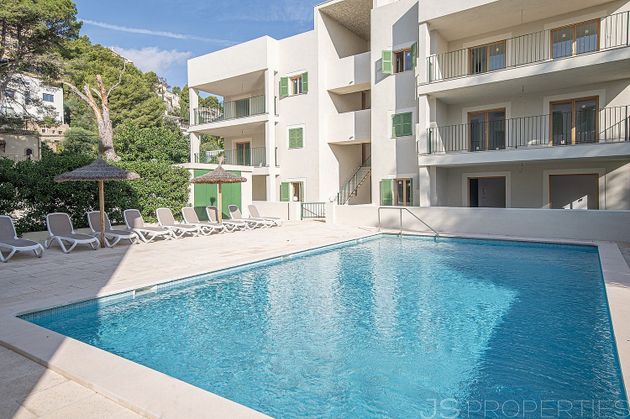 Foto 1 de Piso en venta en Port de Pollença de 4 habitaciones con terraza y piscina