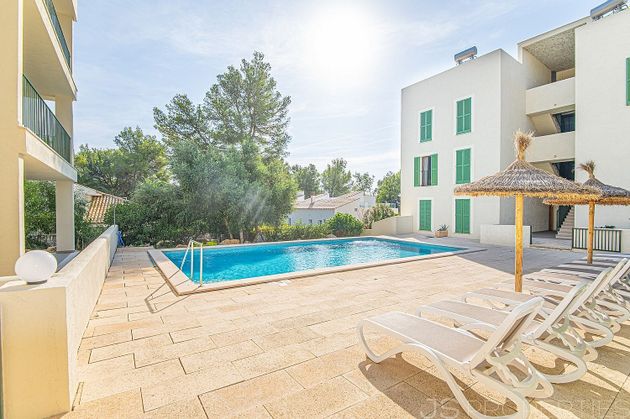 Foto 1 de Piso en venta en Port de Pollença de 4 habitaciones con terraza y piscina