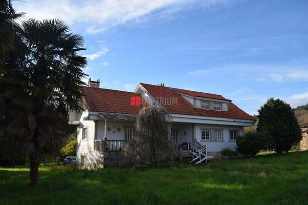Foto 1 de Casa en venta en Boqueixón de 4 habitaciones con terraza y balcón