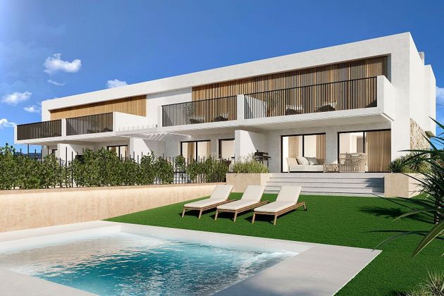 Foto 1 de Casa adossada en venda a calle Vauma de 3 habitacions amb terrassa i piscina