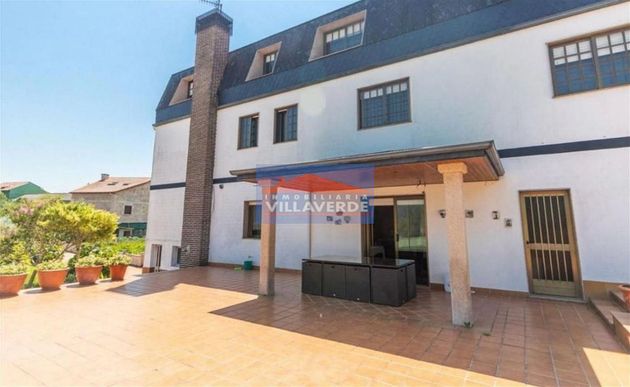 Foto 1 de Casa en venda a Cangas de 9 habitacions amb terrassa i piscina