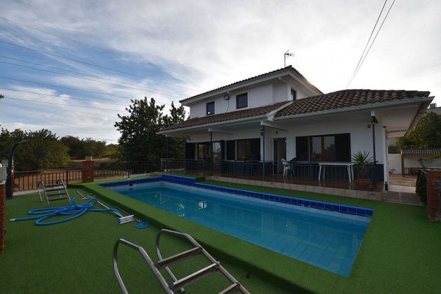 Foto 1 de Chalet en venta en Pobla de Montornès, la de 4 habitaciones con terraza y piscina