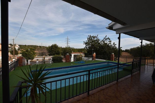 Foto 2 de Chalet en venta en Pobla de Montornès, la de 4 habitaciones con terraza y piscina