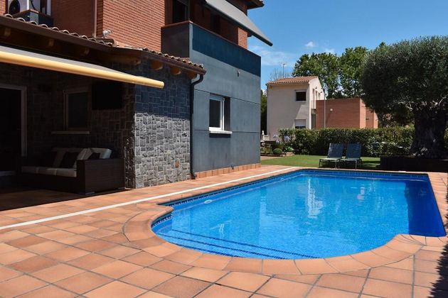 Foto 1 de Casa adossada en venda a Polinyà de 4 habitacions amb terrassa i piscina