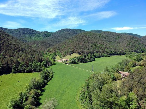 Foto 1 de Casa rural en venda a Vall de Bianya, la de 8 habitacions amb jardí
