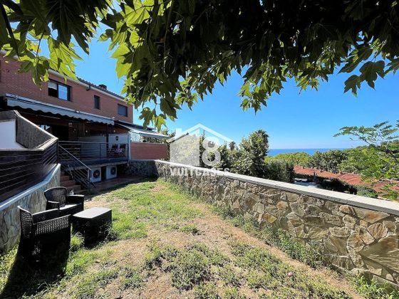 Foto 1 de Casa en venda a Arenys de Mar de 4 habitacions amb piscina i jardí