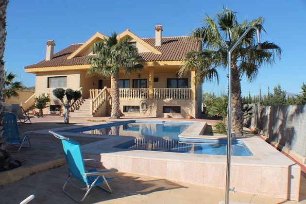Foto 1 de Chalet en venta en La Huerta de 9 habitaciones con terraza y piscina