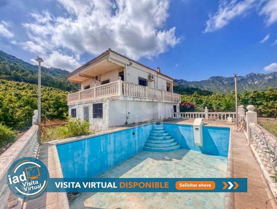Foto 1 de Casa en venda a Llaurí de 5 habitacions amb terrassa i piscina