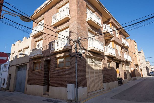 Foto 1 de Casa adosada en venta en calle Mossen Cinto Verdaguer de 4 habitaciones con terraza y balcón