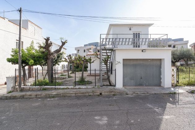 Foto 1 de Venta de casa adosada en calle De la Riva de 3 habitaciones con terraza y garaje