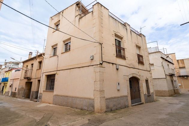 Foto 1 de Casa adossada en venda a calle De Sabadell de 5 habitacions amb terrassa i aire acondicionat