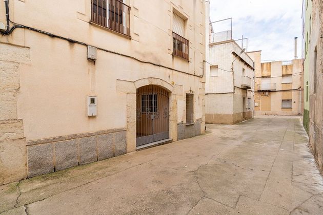 Foto 2 de Casa adosada en venta en calle De Sabadell de 5 habitaciones con terraza y aire acondicionado