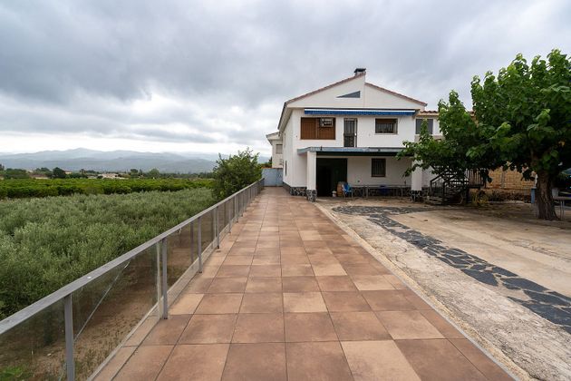 Foto 2 de Casa adossada en venda a calle Partida Sant Bernabe amb terrassa i piscina