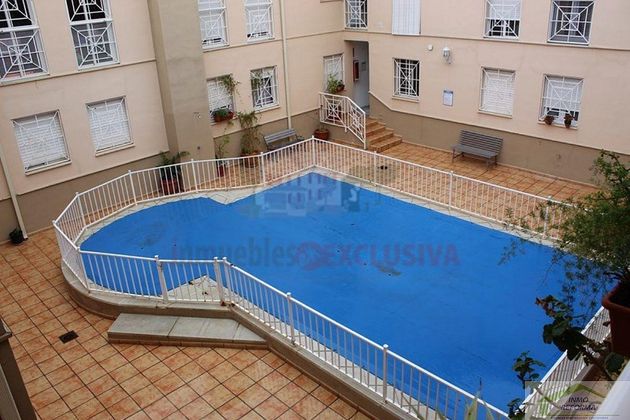 Foto 1 de Venta de piso en Cúllar Vega de 2 habitaciones con piscina y aire acondicionado