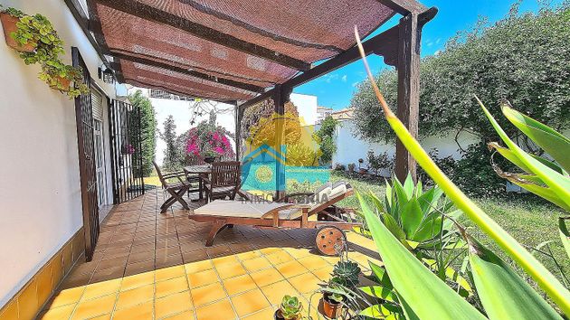 Foto 1 de Venta de chalet en Cartaya de 4 habitaciones con terraza y jardín