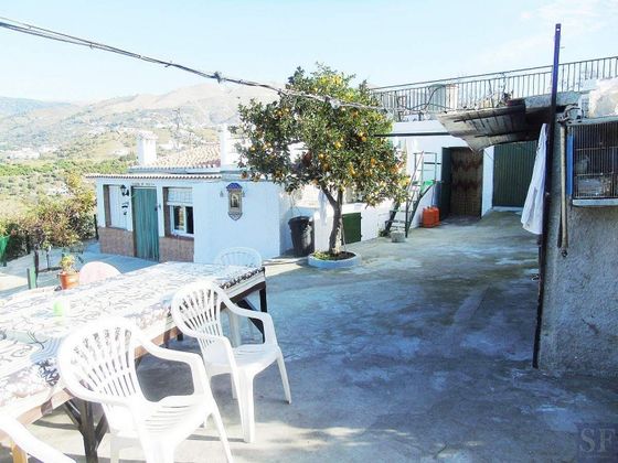 Foto 1 de Venta de casa adosada en Árchez de 3 habitaciones con terraza y piscina
