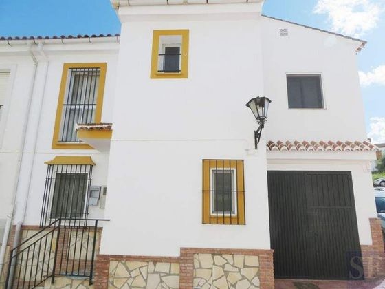 Foto 1 de Casa adossada en venda a Viñuela de 3 habitacions amb garatge i aire acondicionat