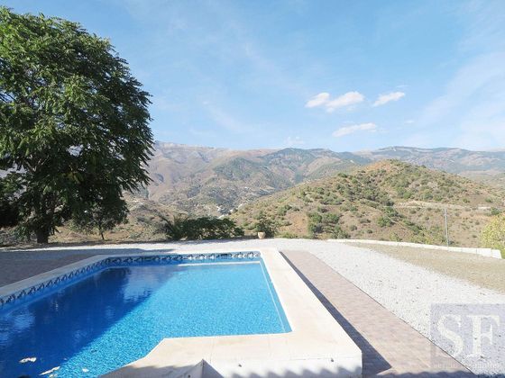 Foto 2 de Casa adosada en venta en Canillas de Albaida de 3 habitaciones con terraza y piscina