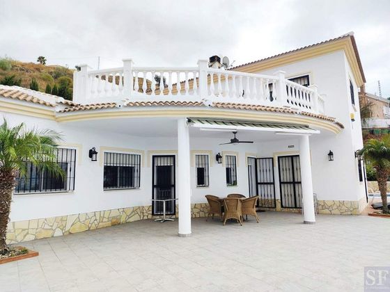 Foto 1 de Venta de casa adosada en Algarrobo de 4 habitaciones con terraza y piscina