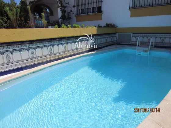 Foto 1 de Casa en venta en Matalascañas de 9 habitaciones con piscina y balcón