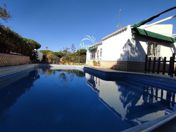 Foto 2 de Chalet en venta en Matalascañas de 4 habitaciones con piscina