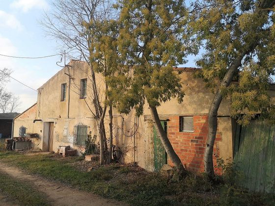 Foto 1 de Casa rural en venda a Llagostera de 5 habitacions amb jardí