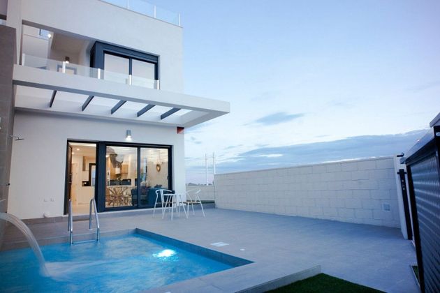 Foto 1 de Venta de casa adosada en Campos de Golf - Villa Martin - Los Dolses de 3 habitaciones con terraza y piscina