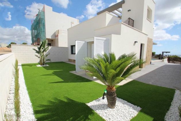 Foto 2 de Xalet en venda a Dehesa de Campoamor - La Regia - Aguamarina de 4 habitacions amb terrassa i piscina