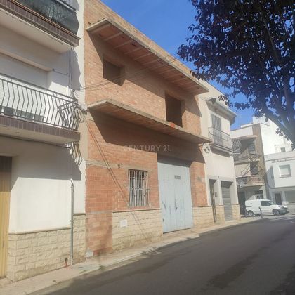 Foto 1 de Casa en venda a calle Pau Claris de 5 habitacions amb garatge i balcó
