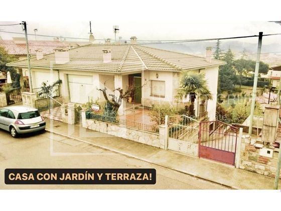 Foto 1 de Venta de casa adosada en calle Bellaterra de 5 habitaciones con terraza y garaje