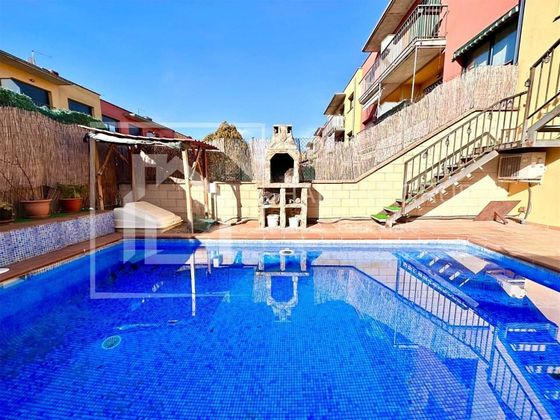 Foto 1 de Casa adossada en venda a Cassà de la Selva de 3 habitacions amb terrassa i piscina
