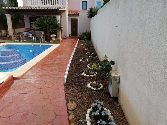 Foto 1 de Casa adosada en venta en Badia Blava-Badia Gran-Tolleric de 3 habitaciones con terraza y piscina
