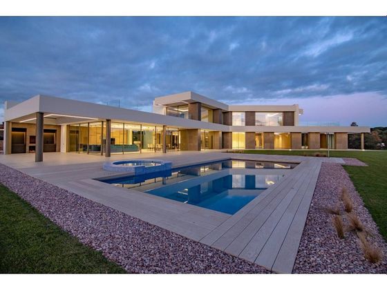 Foto 1 de Casa adosada en venta en Caldes de Malavella de 5 habitaciones con terraza y piscina