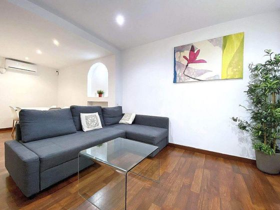 Foto 1 de Casa adosada en venta en Sants-Badal de 4 habitaciones con terraza y aire acondicionado