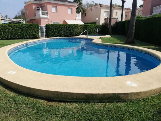 Foto 1 de Venta de chalet en Oliva Nova de 2 habitaciones con piscina y aire acondicionado