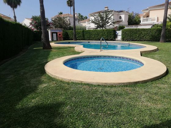 Foto 2 de Venta de chalet en Oliva Nova de 2 habitaciones con piscina y aire acondicionado