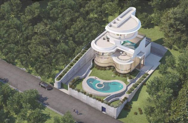Foto 1 de Xalet en venda a urbanización Llagostera Residencial de 5 habitacions amb terrassa i piscina