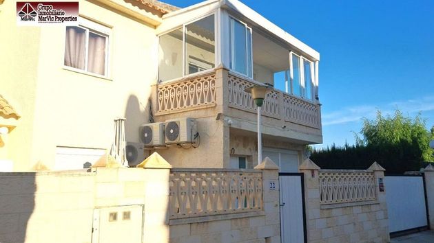 Foto 2 de Casa adosada en venta en Rincón de Loix de 4 habitaciones con terraza y piscina