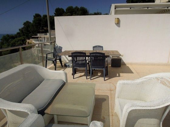 Foto 2 de Venta de casa adosada en Zona de Mascarat de 4 habitaciones con terraza y piscina