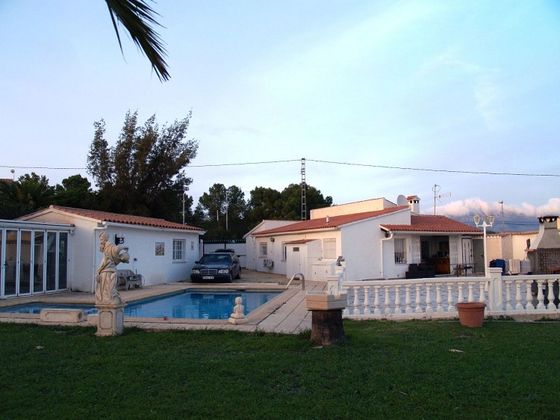 Foto 1 de Casa en venda a Colonia Escandinavia-Cautivador de 3 habitacions amb terrassa i piscina