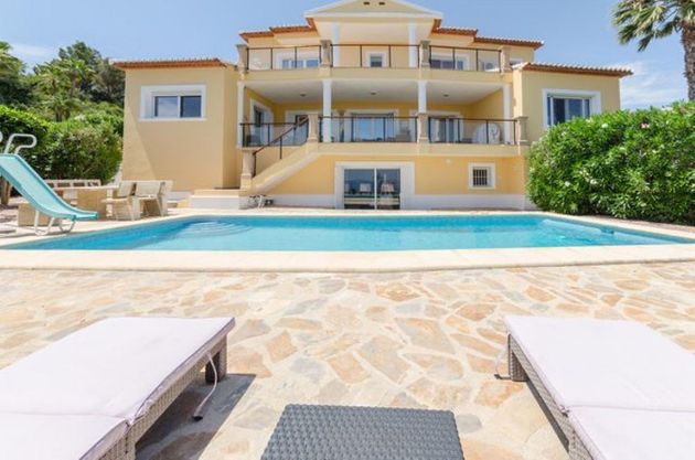 Foto 1 de Casa en venta en Partides comunes - Adsubia de 8 habitaciones con terraza y piscina