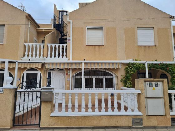 Foto 1 de Venta de casa adosada en calle Goleta de 3 habitaciones con terraza y piscina