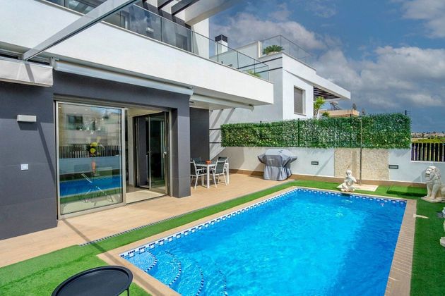 Foto 1 de Venta de chalet en Campos de Golf - Villa Martin - Los Dolses de 1 habitación con terraza y piscina