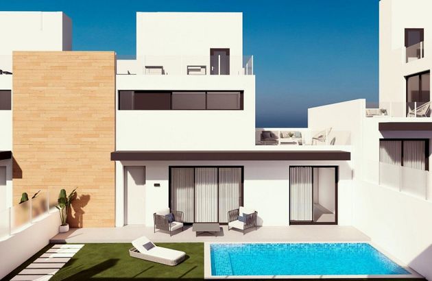 Foto 1 de Venta de casa adosada en Campos de Golf - Villa Martin - Los Dolses de 2 habitaciones con terraza y piscina