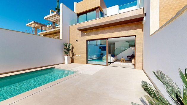 Foto 1 de Casa adossada en venda a Algorfa de 3 habitacions amb terrassa i piscina