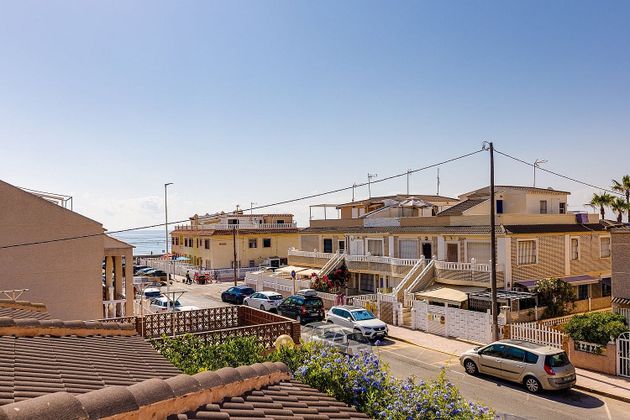 Foto 2 de Venta de chalet en Torrelamata - La Mata de 4 habitaciones con terraza y piscina